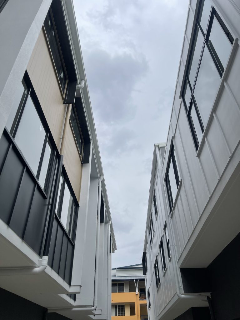 upward view of townhouses on the outside